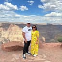Pastor David Fernan profile picture standing on a mountain with his wife